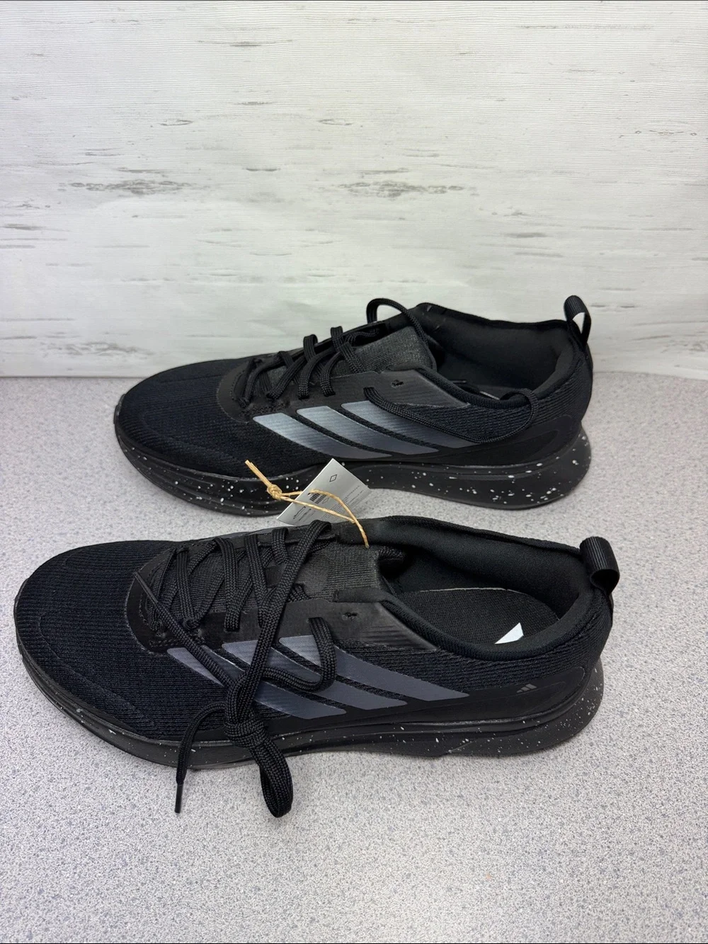 adidas Men's Black Athletic Shoes with Silver Stripes